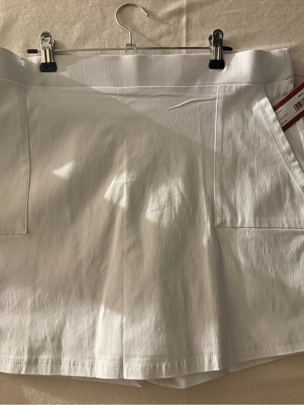 Scarlett White Mini Skirt with Red Brand Tag